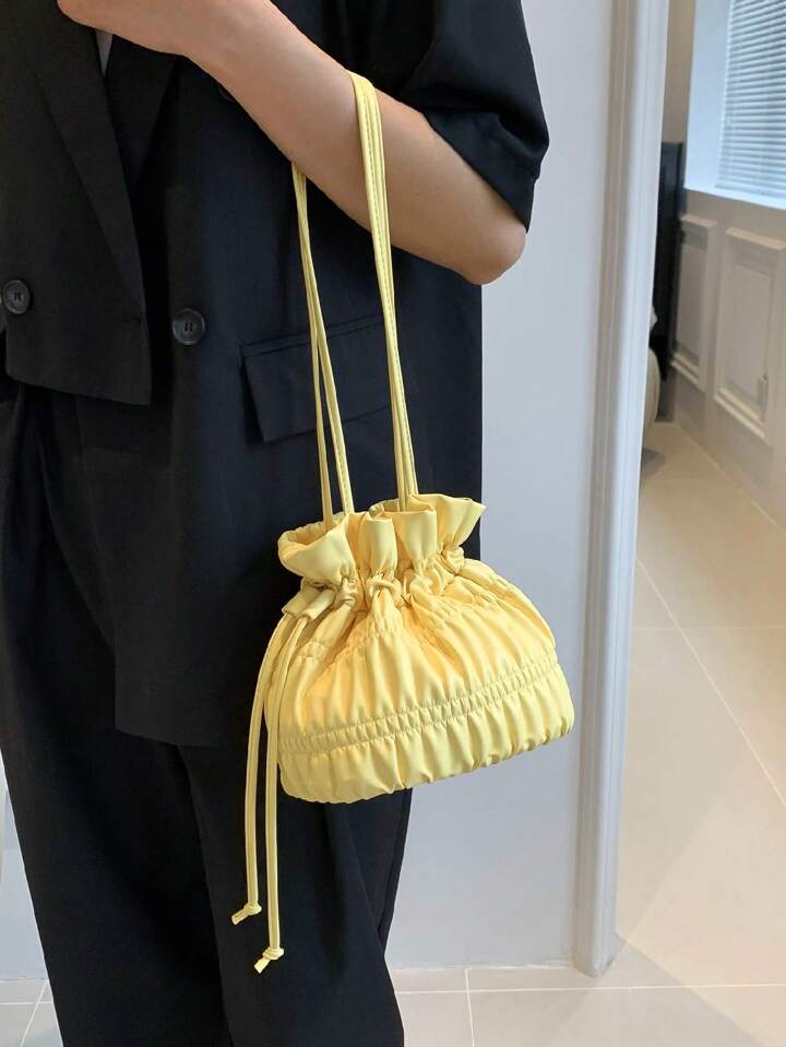 Feather Light Yellow Potli Sling Bag